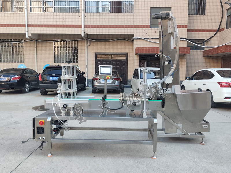 江蘇星火自動(dòng)壓蓋封口機(jī)