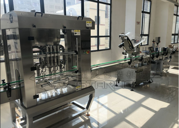 星火辣椒醬灌裝封口機械設(shè)備展示