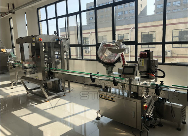 星火瓶裝自動化醬料封口機械展示