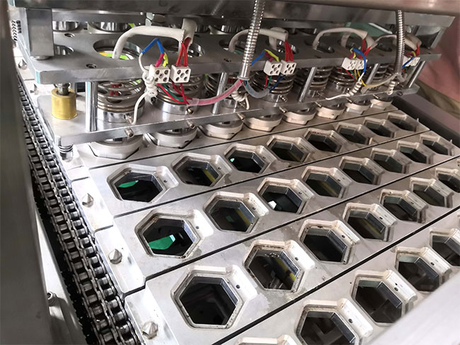 星火杯盒自動(dòng)灌裝封口機(jī)設(shè)備展示