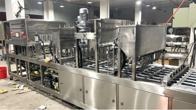 星火杯盒自動(dòng)灌裝封口機(jī)設(shè)備展示